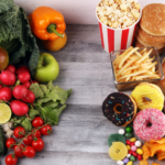 Fresh fruit and vegetables compared with ultra-processed foods, illustrating how processed foods can influence children's taste preferences.