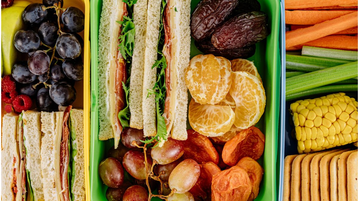 Healthy school lunchbox with sandwiches, fruit and vegetables