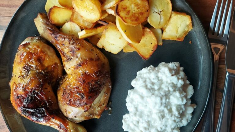Oven baked chicken legs with fried potatoes and garlic cottage cheese