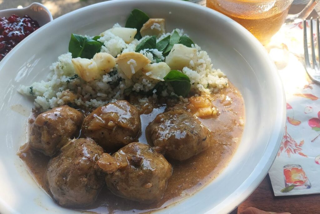 Creamy Swedish meatballs served with celeriac, spinach and basmati rice