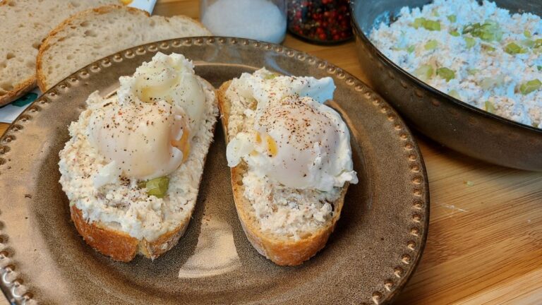 Polish twaróg and mackerel spread on sourdough toast with poached eggs