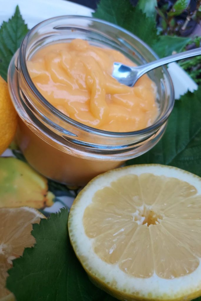 Creamy homemade lemon curd with fresh lemon